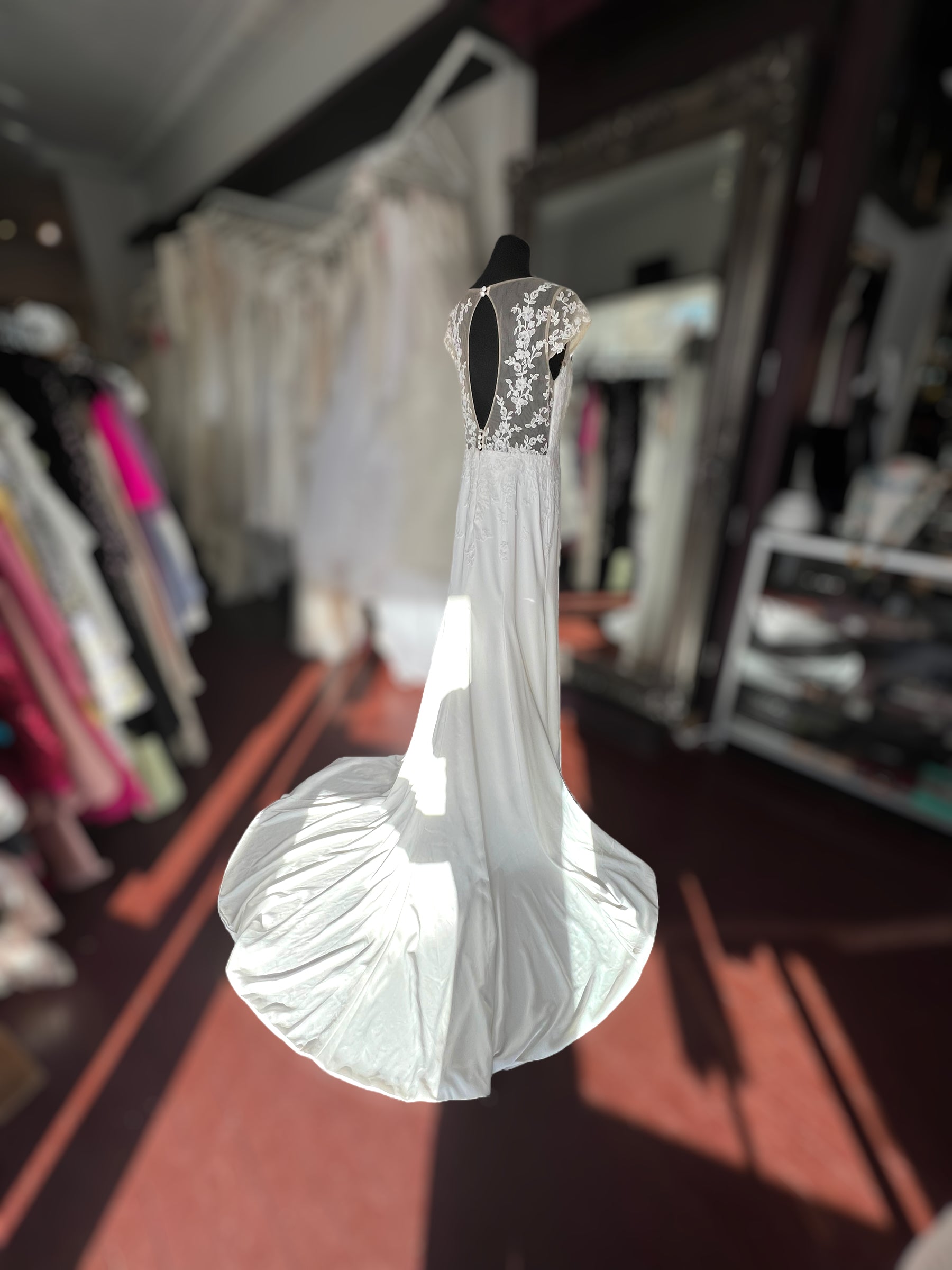 Crepe wedding dress with lace cap sleeves
